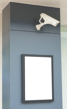 blank billboards attached to a wall with Video surveillance came