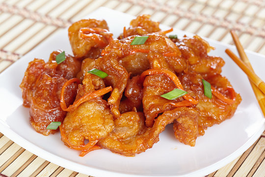 Chinese cuisine. Pork in batter and sweet and sour sauce
