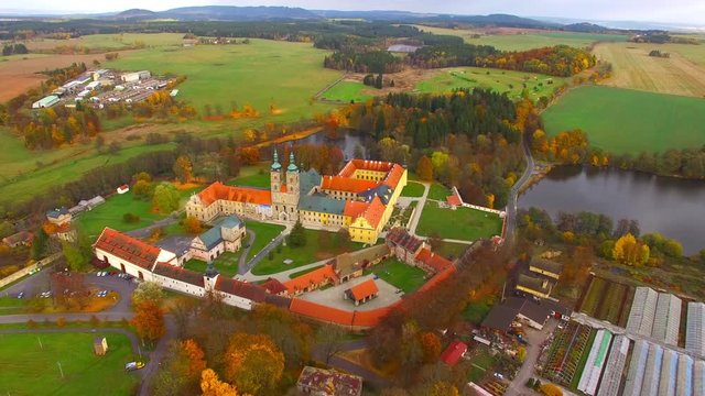 Tepla Abbey  is a Premonstratensian abbey in the western part of Bohemia.  It was founded in 1193. Camera flight over beautiful landmark near Karlovy Vary, Czech Republic, Central Europe.