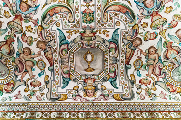 Fototapeta na wymiar Monastery of San Isidoro del Campo. Ceiling detail. Frescoes and paintings in ancient Cistercian monastery in Santiponce. Seville. Spain.
