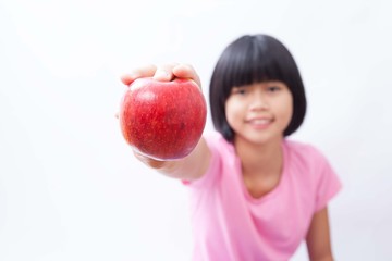 Fototapeta na wymiar Happy girl with apple
