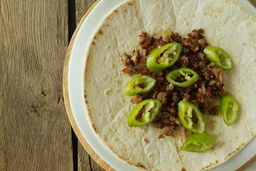 Tortilla with chilli pepper and beef