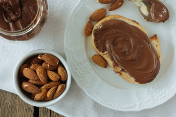 Almond and bread with chocolate paste top view