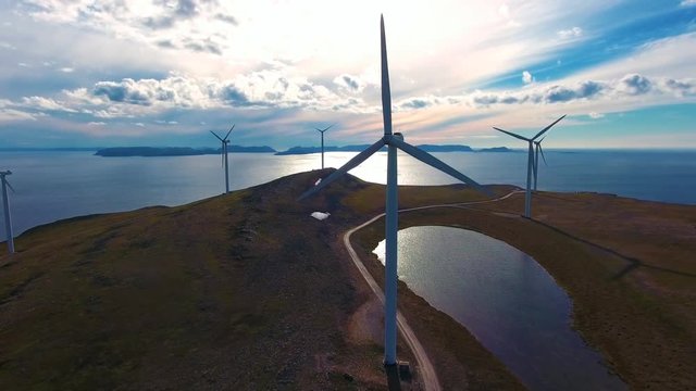 Windmills for electric power production. Arctic View Havoygavelen windmill park, Havoysund, Northern Norway Aerial footage.