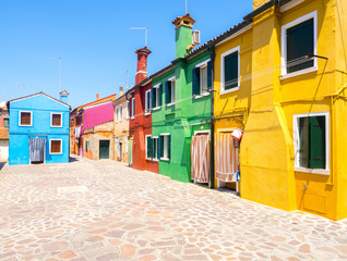 Colorful houses facade exteriors in Burano town, near Venice