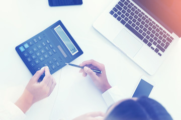 Two women calculating