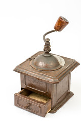 Old rustic wooden hand mill for coffee and spices