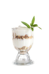 isolated vanilla parfait with granola and mint