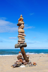 Balance and poise stones. Rock zen on the background of blue sky