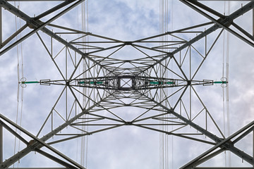 geometric view under of a high voltage pylon