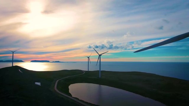 Windmills for electric power production. Arctic View Havoygavelen windmill park, Havoysund, Northern Norway Aerial footage.