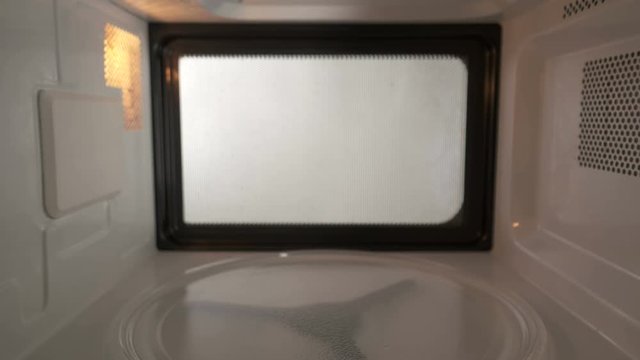 Dangerous turning on an empty microwave with nothing inside it. It can damage your microwave oven.