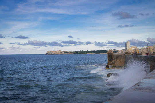 Waves crashing against the wall of El Malecon - Havana, Cuba