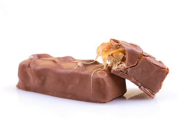 Chocolate bar with caramel on white