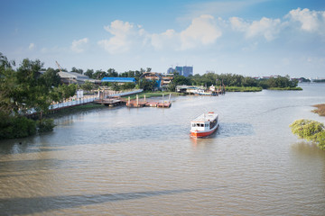 Fototapeta na wymiar passenger wooden boat in tourism business in thailand floating o