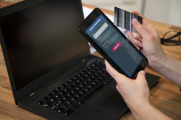 Online banking with touchpad and credit card.