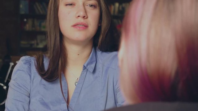 Young attractive woman during job interview