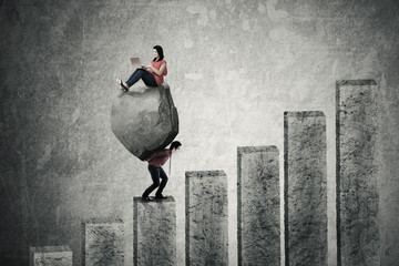 Woman and her partner with stone