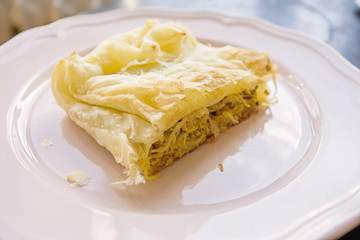 Piece of fresh baked homemade cabbage strudel