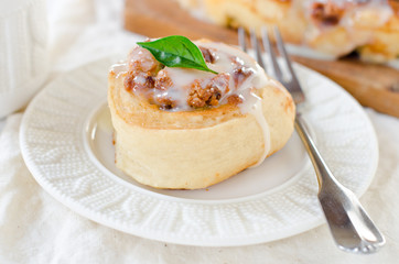 Cinnabon with cottage cheese, raisins and cinnamon in the glaze