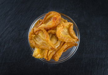 Dried Pears (close-up shot) on a slate slab