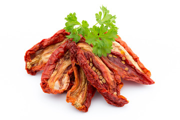 Dried tomatoes isolated on white background.