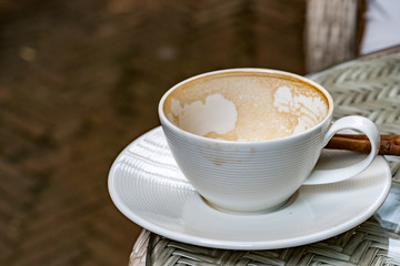 Empty white cup on table