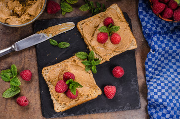 Toast with peanut butter and berries