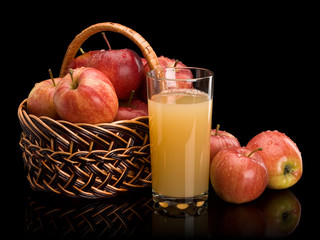 Ripe apples and juice with pulp