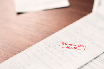 Biometrics done signet on a visa application payment receipt