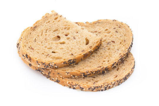 Sliced white bread with cereals. Isolated over white background.