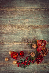 Christmas decoration on abstract background,vintage filter. Instagram colors toning. Xmas card and gift. Winter holidays theme. Top view. Empty space for text.
