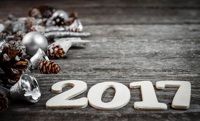 Christmas Decoration Over Wooden Background. Xmas card and gift. Winter holidays theme. Empty space for text.