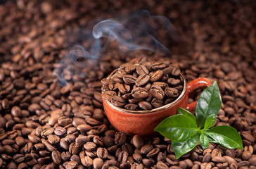 Beans roasted coffee and leaves. Coffee background