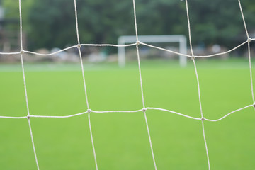 The view behind football or soccer net, background concept