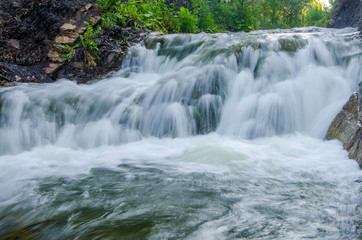 Fototapeta premium falling water in the morning mist.