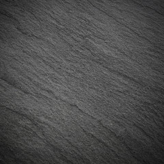 Dark grey black slate background or texture.