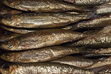 Seafood, top view of group smoked fish in a supermarke, close-up
