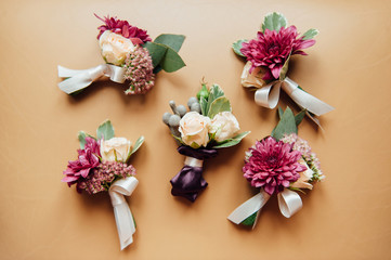 wedding boutonniere on a vintage wooden table