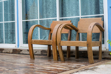 Wooden Chairs on balcony.