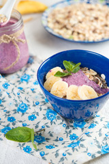 Healthy breakfast. Organic muesli with natural yogurt and bilberry
