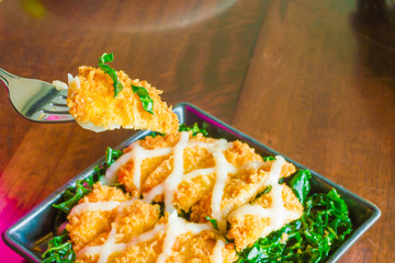 breaded fish fingers with mayonnaise