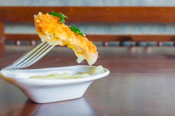 breaded fish fingers with mayonnaise