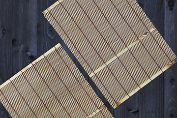 Wood bamboo mat on table, top view