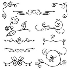 set of doodle style swirls with girly elements