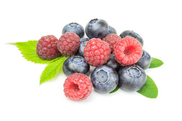 Ripe raspberry with blueberry isolated on white