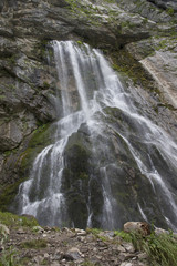Fototapeta na wymiar Beautiful mountains waterfall.