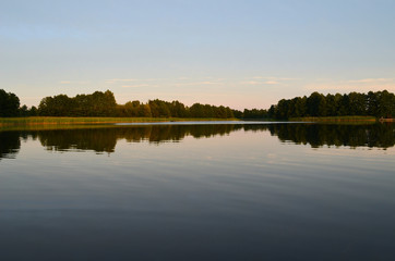 Fototapeta na wymiar Lake landscape sun down