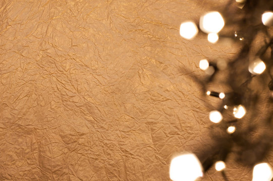 Christmas golden background with blurred lights. Place for text