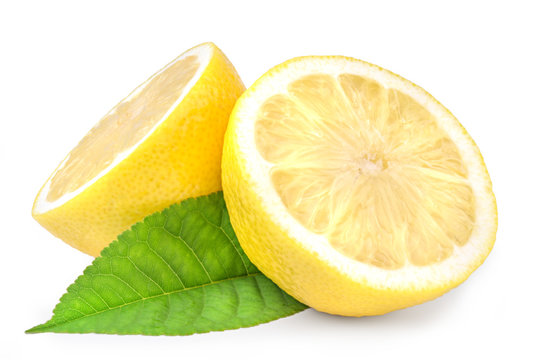 Lemon Wedges With Leaves On White